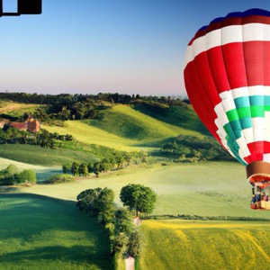 Flying in a hot air balloon over the Tuscan hills